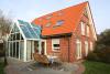 Spiekeroog Foto 9 Gartenansicht des Wintergartens 
